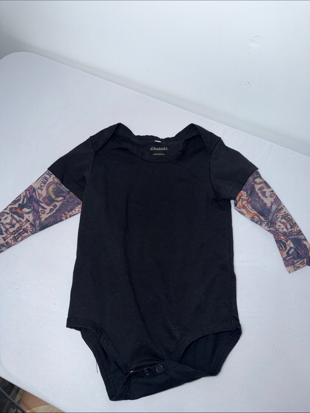 Black Bodysuit with Tattoo-Print Long Sleeves